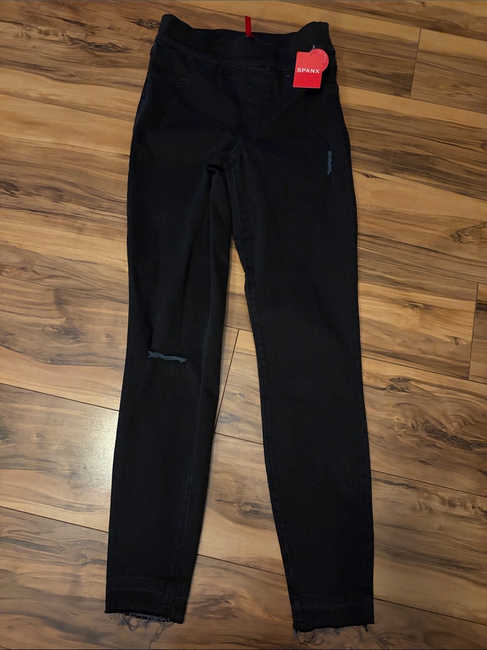 SPANX Black Skinny Jeans with High Waist and Subtle Distress
